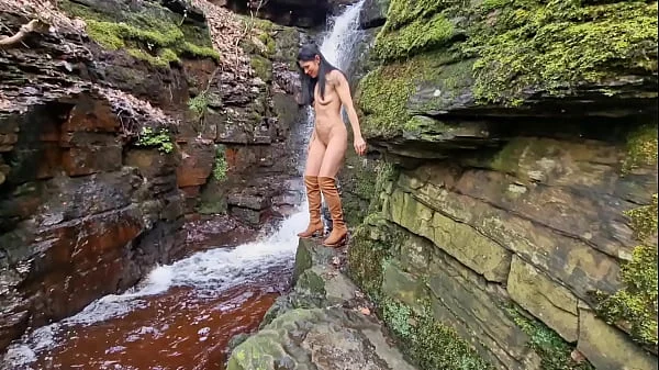 Naked in nature and peeing