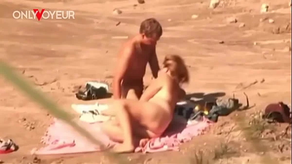 Beach Voyeur. Horny teen couple fucking on a public beach and cumming together