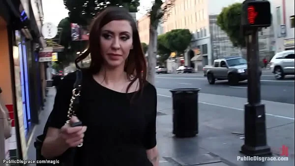 Brunette slave humiliated on the streets