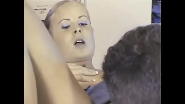 Lustful chick with a ponytail exposes her anal hole and wet pussy under her lover's elastic tongue on the kitchen table